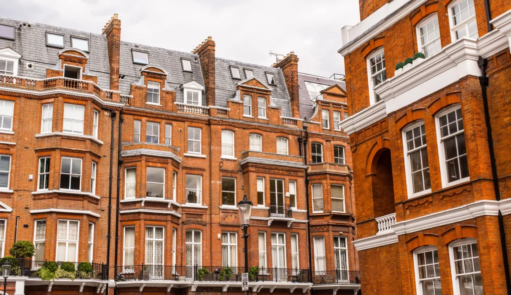 Homeowner weighing options between one or two Party Wall Surveyors Kingston upon thames